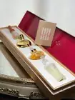 Shiseido gold collection parfums set Petit Four collection. Sealed bottle.