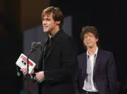 Jim Carrey wins the Leading Man award presented by Mick Jagger Old Photo