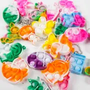 10Pcs Colorful Bunny Rabbit Egg Mini Pop Keychain Sensory Finger Fidget Toy for