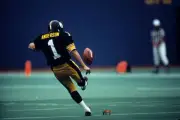 Kicker Gary Anderson Pittsburgh Steelers kicks off during a game a- Old Photo