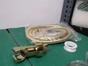 gold colored hand held shower hose set