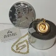 August Steiner JFK1972 coin pocket watch w/chain gold tone Quartz date/day w/tin
