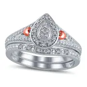 0.10 CT. T.W. Composite Natural Diamond Pear Frame with Side Hearts Bridal Engagement Ring Set in Sterling Silver and Solid 14K Rose Gold