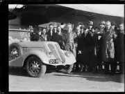 Aviator Charles Kingsford Smith with a crowd beside his specially - Old Photo