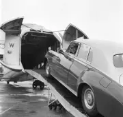 Actor Alec Guinness loading his Bentley onto an aircraft bound for- 1958 Photo 4