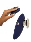 Small rechargeable silicone vaginal vibrator stimulates vibrating clitoris