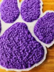 This beautiful Purple 3" iron on chenille and embroidered Paw patch is a beauty!