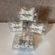Bundle of Bow Taper Candle Holders Ceramic, Iridescent 4 packs of 2. New Target