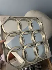 new mirror 18” x 18” Olympia Mirror with 9 overlapping circles.