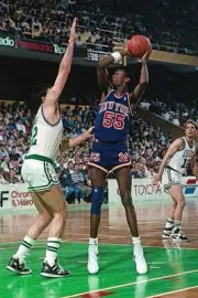 Louis Orr New York Knicks looks to make a shot v Kevin McHale Bost- Old Photo