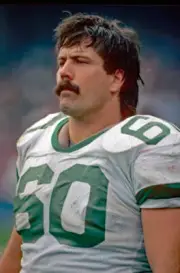 Offensive lineman Dan Alexander#60 New York Jets looks on from the- Old Photo