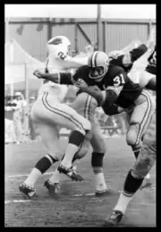 Green Bay Packers Fullback Jim Taylor throws a block during the St- Old Photo