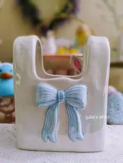Target Bullseye’s Spring 2025 Iridescent Purse Novelty Vase With Blue Bow 6.5"H