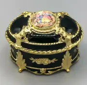 Black Enameled Music Box by Splendid, plays Bolero, Oval shaped