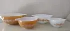 UNUSED VINTAGE PYREX CINDERELLA NESTING BOWLS (441-444). GOLD AND WHITE