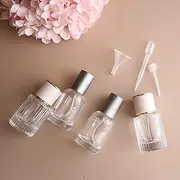 BRMM MIA 4pcs 30ml 1.05 oz Refillable Spray Perfume Bottles cosmetic Fine Mist Atomizer Empty Portabe Clear Glass Essential Oil Container for Travel Wedding Gifts Car Décor,Set of 4