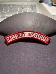 Army Patch: ROTC "Military Institute" tab - red on white, merrowed edge 4” X 1”