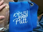 Blue kiss my putt golf towel with clip. Brand new