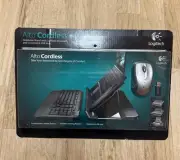 New Logitech Alto Cordless Notebook Stand with Cordless Keyboard, USB Hub, Mouse