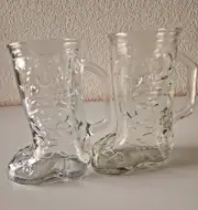 A Pair Of Vintage Clear Glass Cowboy Boot Shapped Muggs
