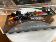 Bburago 1:43 Signature F1 2023 Redbull RB19 Chequito Bebe #11