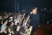 Run DMC goes right to the edge of the stage while performing at Cl - Old Photo