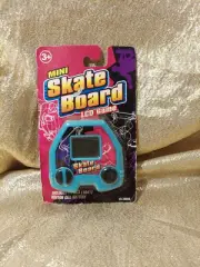 Techno Source Skateboard LCD VIDEO GAME Mini Handheld Electronic Pocket 2004 Vtg