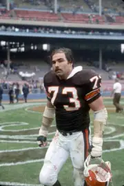 Offensive lineman Doug Dieken of the Cleveland Browns walks off - 1984 Old Photo