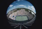 Fisheye view of the crowd and the court during the US Open at the - Old Photo