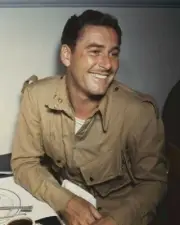 Erroll Flynn smiling between takes 1945 in Objective Burma jacket Poster 24x36