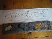 Prim animals and star stair tread rug hooking pattern on gridded trace fabric