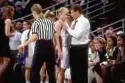 UConn coach Geno Auriemma with Keirsten Walters on sidelines durin- Old Photo