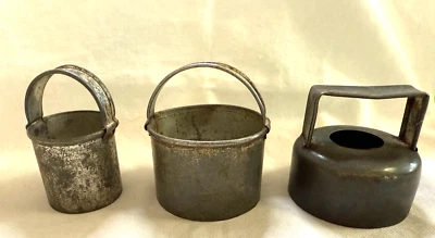 Vintage aluminum group of three biscuit cutter