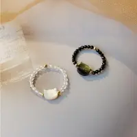 在飛比找樂天市場購物網優惠-水晶戒指串珠指環-貝母貓咪黑尖晶白水晶女飾品2款74bv33