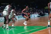 Reggie Carter New York Knicks moves the ball up court against Gera- Old Photo