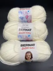 Three BERNÂT Softer Baby Antique White Acrylic Yarns