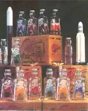 12 GALAXY SPACE FOODS SPACEMAN ASTRONAUT SODA SYRUP BOTTLE COIN BANKS 1950'S