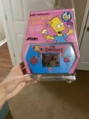 Bart Simpsons Cupcake Crisis Handheld Electronic Video Game by AKKLAIM 1989