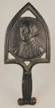 Cast Iron George Washington Trivet by Virginia Metal Crafters. 9" Long.