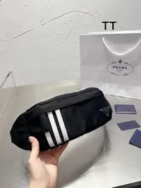 在飛比找Yahoo!奇摩拍賣優惠-新款熱銷 Prada 胸包 腰包 聯名Adidas 降落傘布
