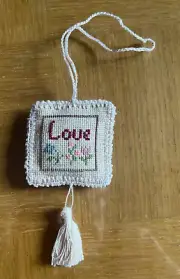 finished completed cross stitch scissors fob Love with crochet border and tassel
