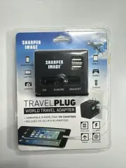 Sharper Image Travel Plug World Travel Adapter New. Dual USB, 2.1 Amps