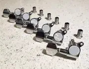 New Fender style vintage gears, plus Input plate,String Trees and Strap buttons.