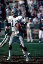 Quarterback Ken Stabler Oakland Raiders drops back to pass v the - 1974 Photo 1