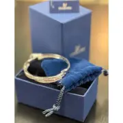 SWAROVSKI Pave Crossover Crystal Hinged Security Latch Bracelet NEW w/box