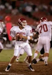 Quarterback Justin Fuente Oklahoma Sooners drops back to pass the - Old Photo
