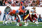 Keith Bishop and Tony Boddie Denver Broncos fights off Charl Football 1988 Photo