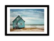 Bluehouse At The Beach Framed Print