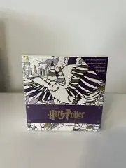 Harry Potter: Winter at Hogwarts: A Magical Colouring Set by Insight Editions...
