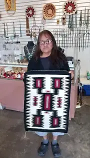 Navajo handwoven storm pattern rug weaving by Hester Watson